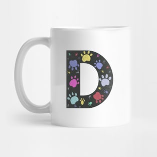 D letter  with colorful paw print Mug